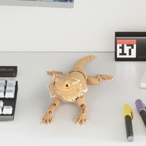 Tan articulated bearded dragon 3D printed toy desk closeup