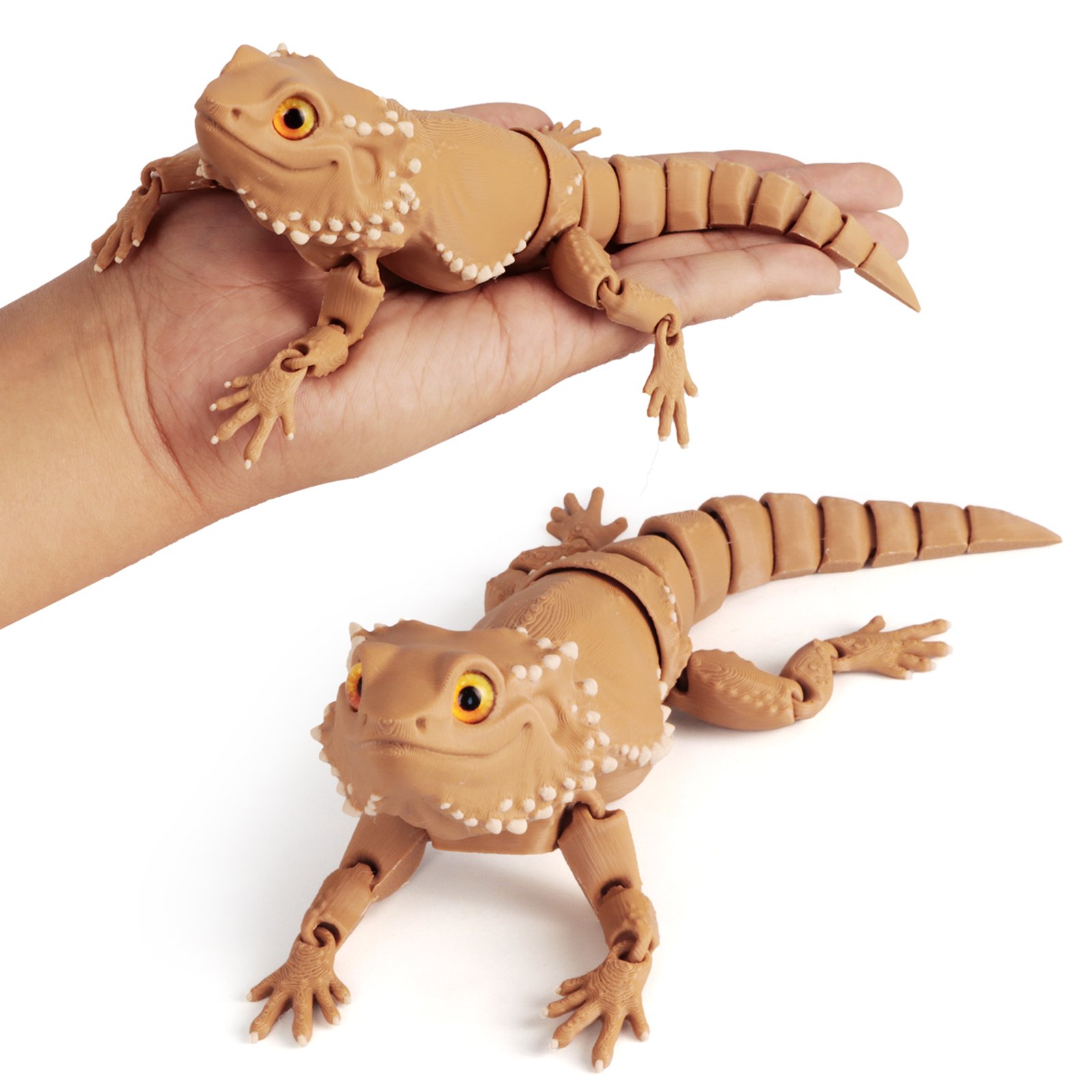 Poseable 3D printed bearded dragon displayed by hand