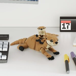 Tan articulated otter 3D printed toy desk resting